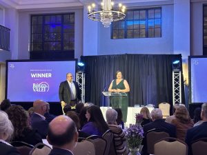 BagValet, based in Charleston, SC accepts the Small Business Award winner at the 2023 InnoVision Awards